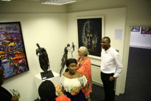 Visitors at the opening day of Chuck Gallery's Summer Exhibition, Seeing in Black and White